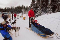 03 Jerome Ryan, Charlotte Ryan and Peter Ryan Taking A Dogsled Tour n The Winter Next To The Road Between Lake Louise Village And Lake Louise In Winter